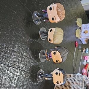 Funko Pop Vinyl Figures with Black and Purple Accents. Hawkeye Show